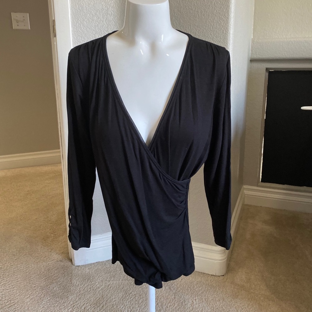 Woman’s black blouse